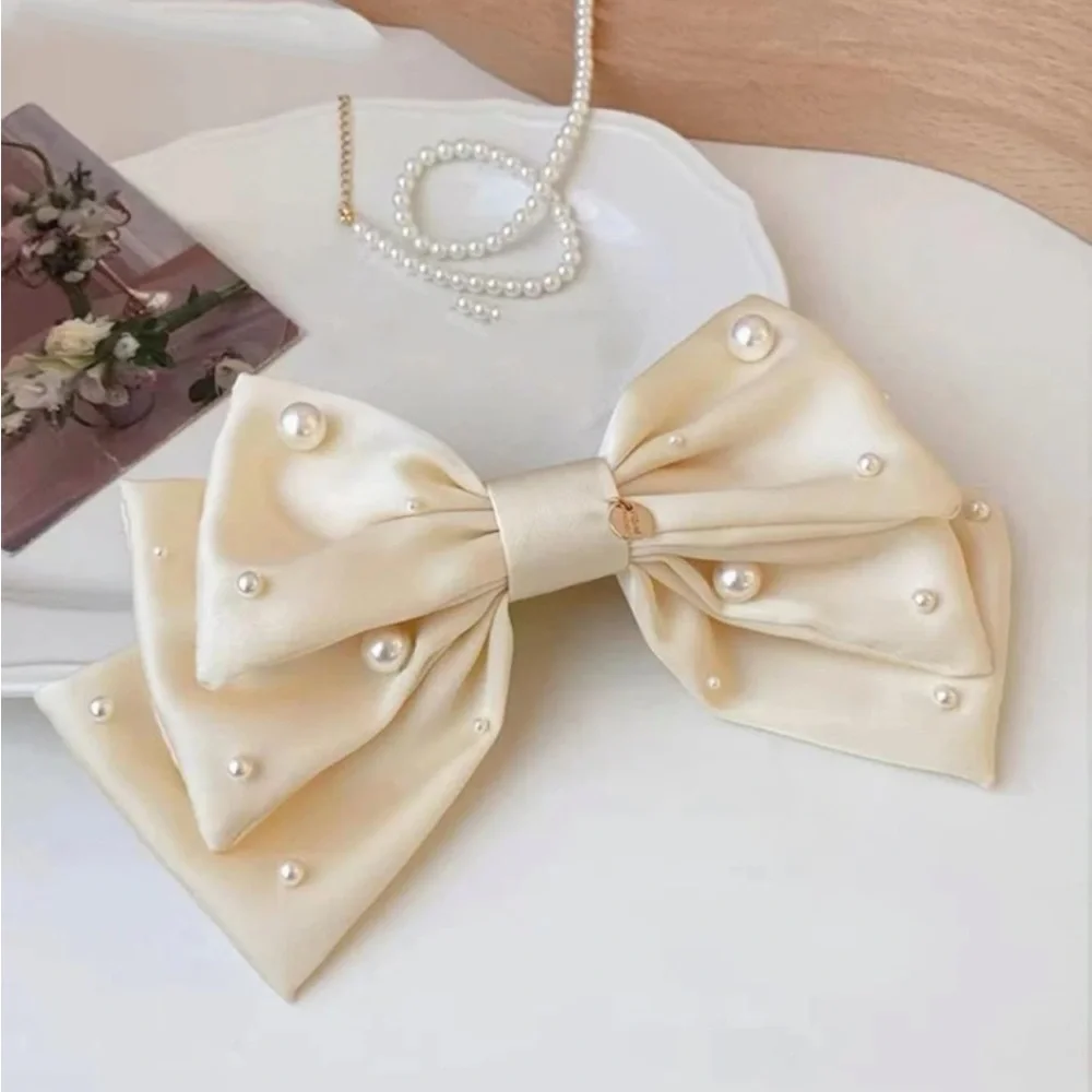 Off white / ivory bow with pearls French clip - Picture 2 of 4